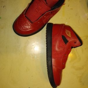 Red leather Jordans size 11C.